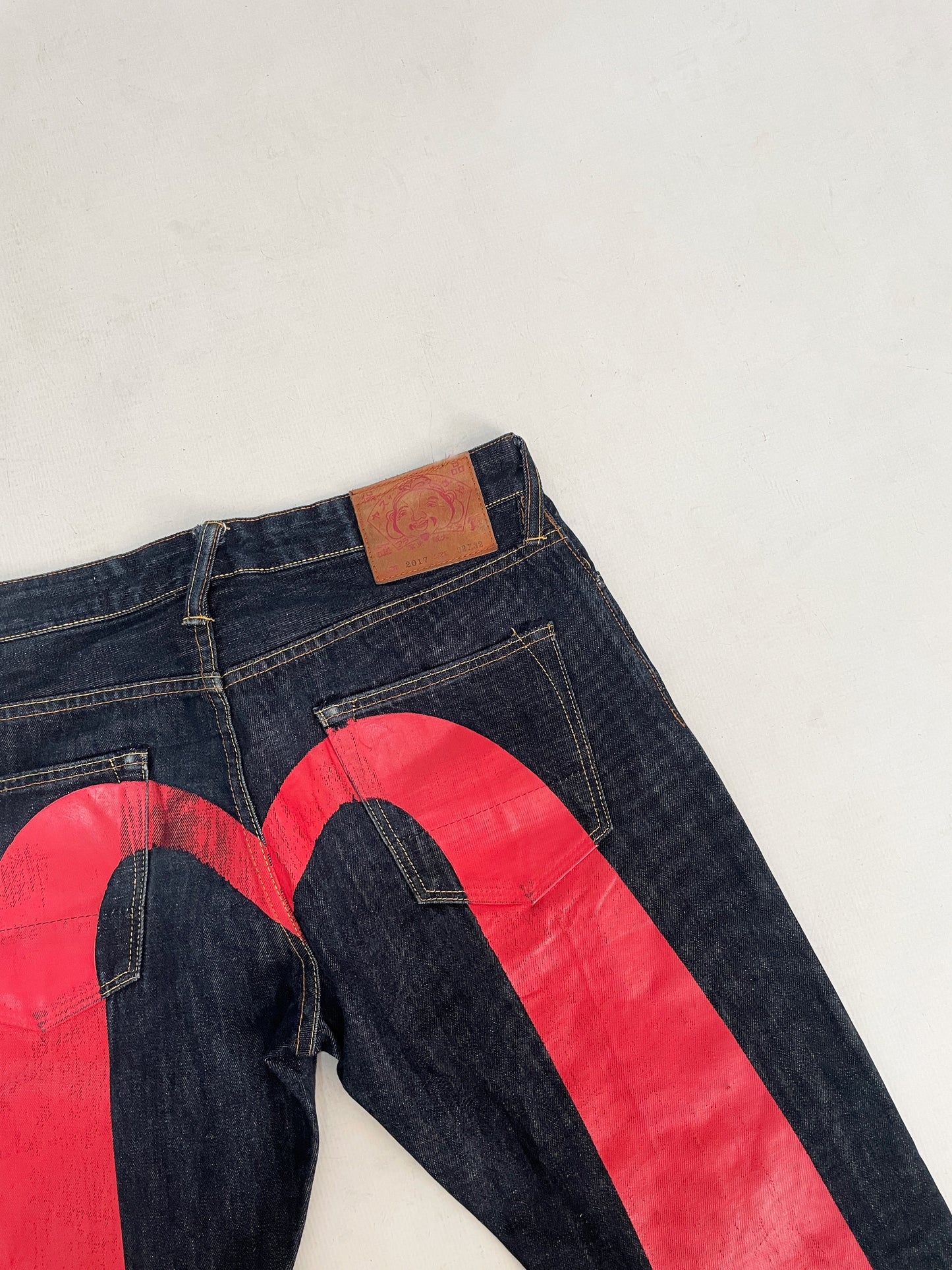 EVISU RED DAICOCK (SKULL) JEANS